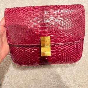 Pre-Owned Burgundy Python Celine classic flap bag.